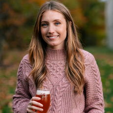 Woman holding a beer 