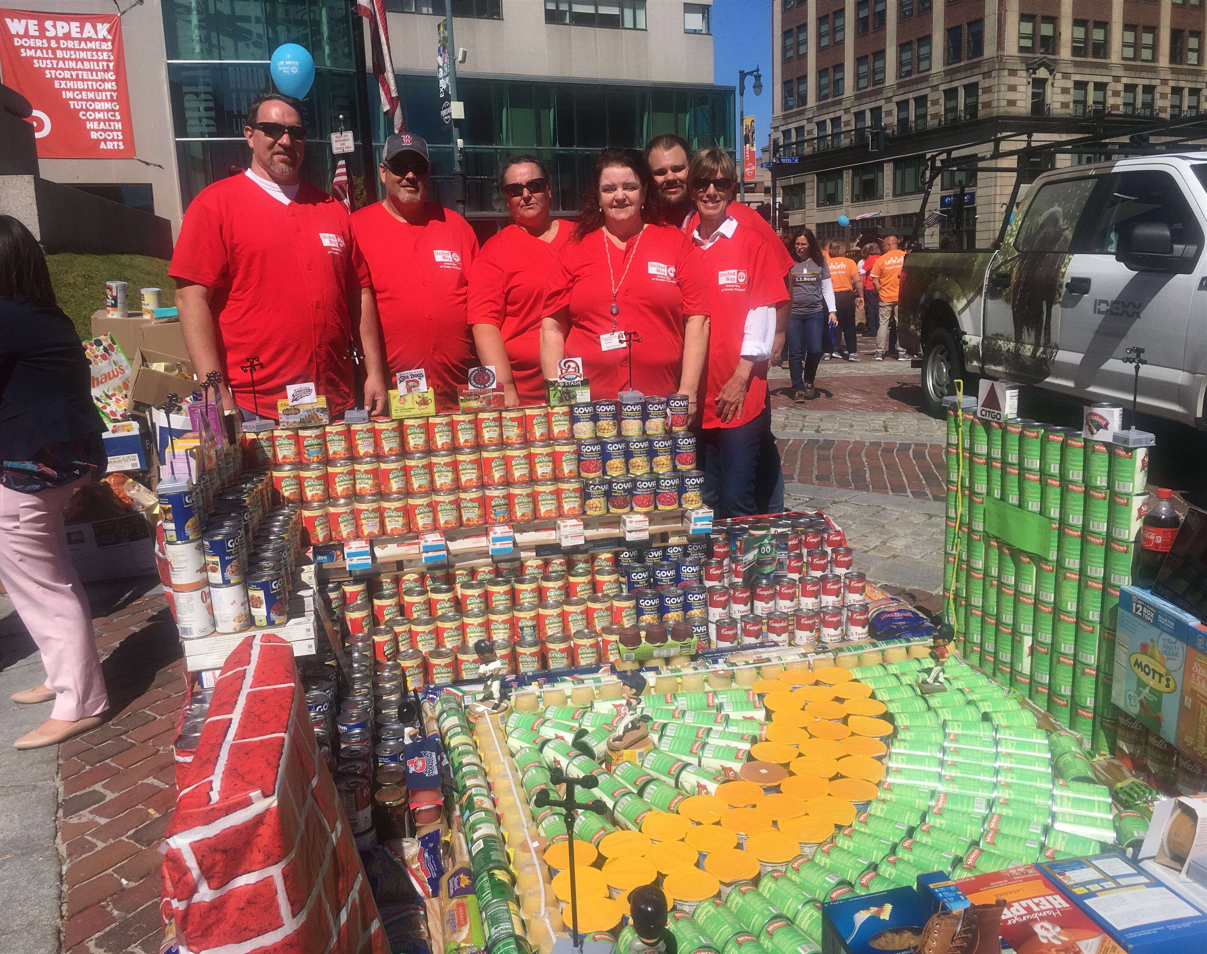 MaineHealth's team and Hadlock Field sculpture