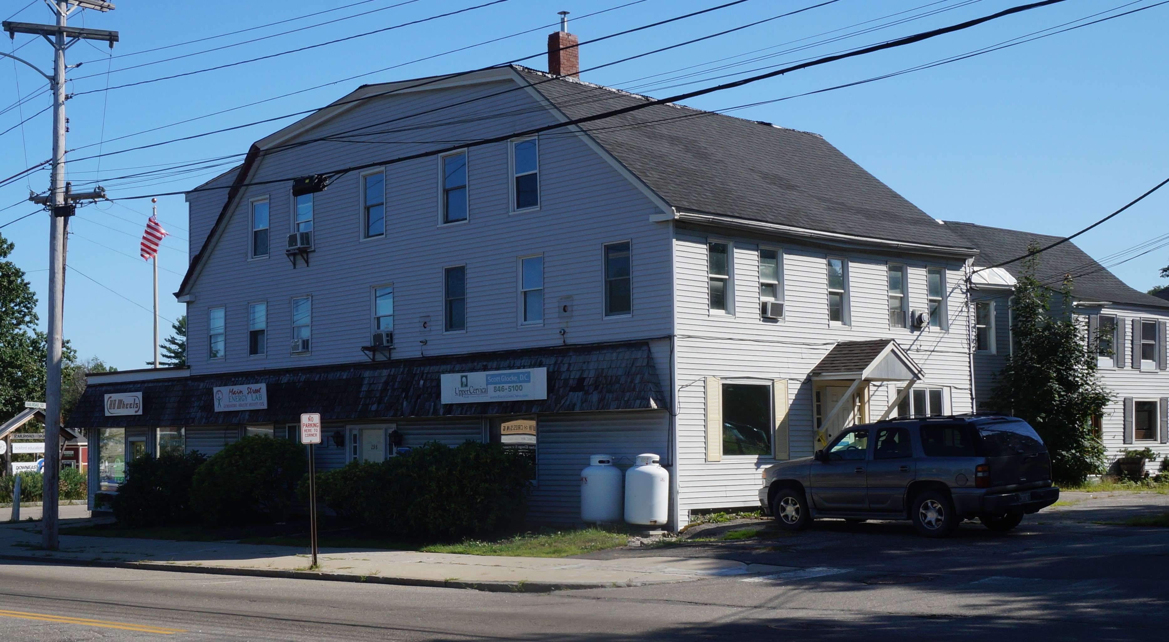 A large building with a gambrel roof