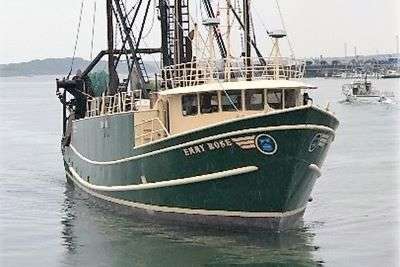 fishing boat with green hull