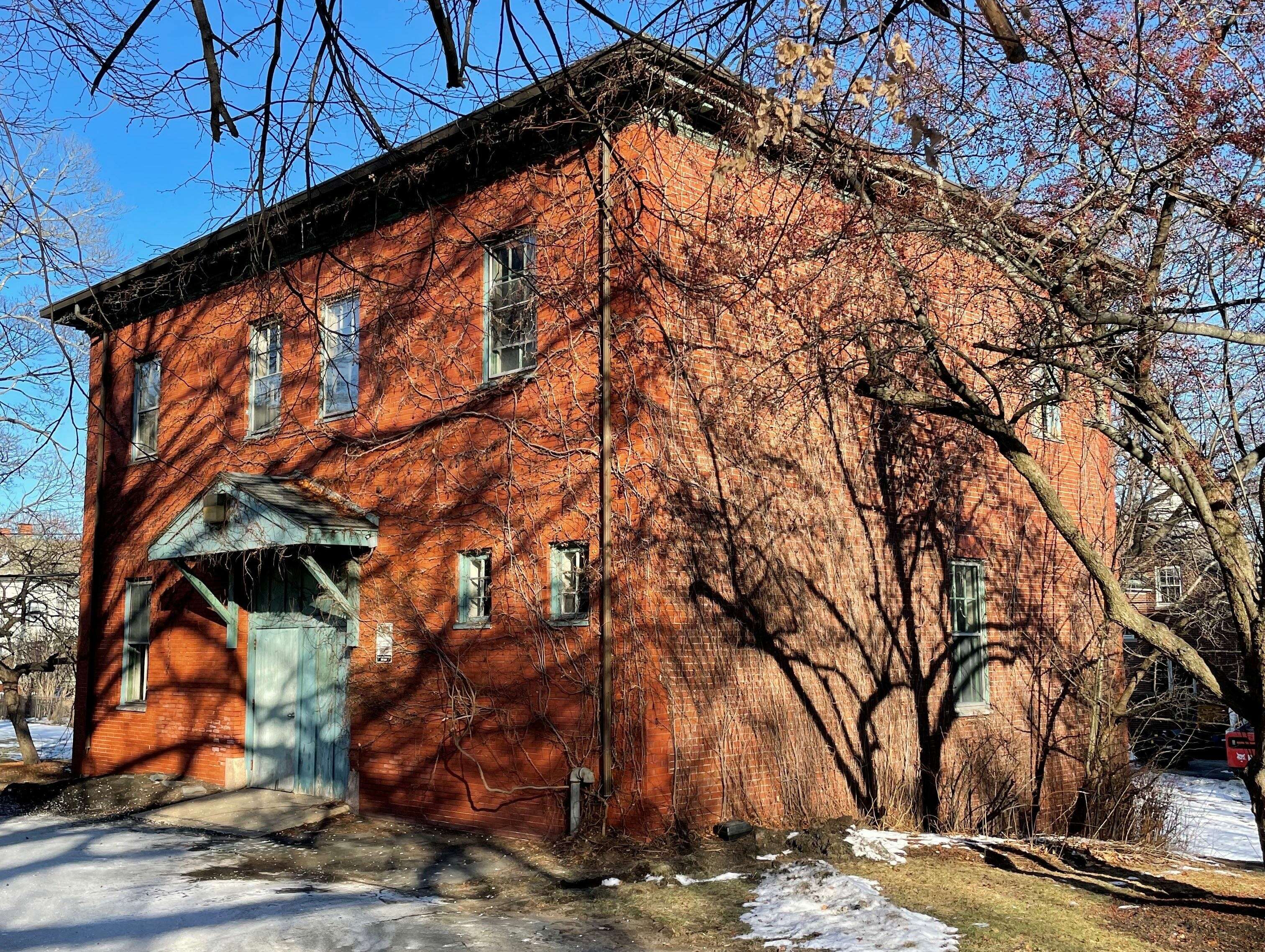 brick building with shadows