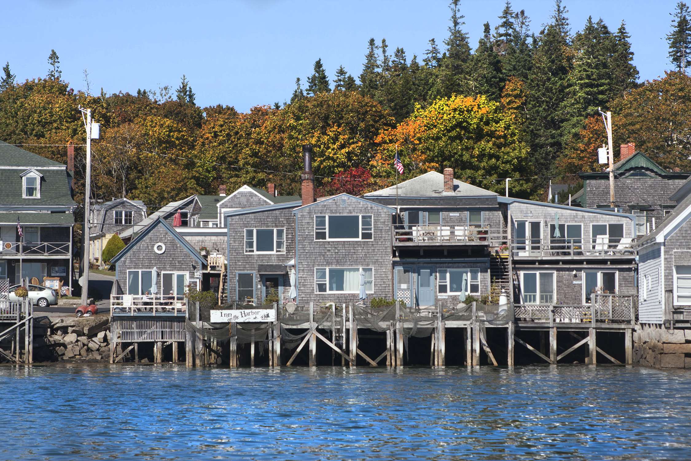 cedar shingled buildings dock water