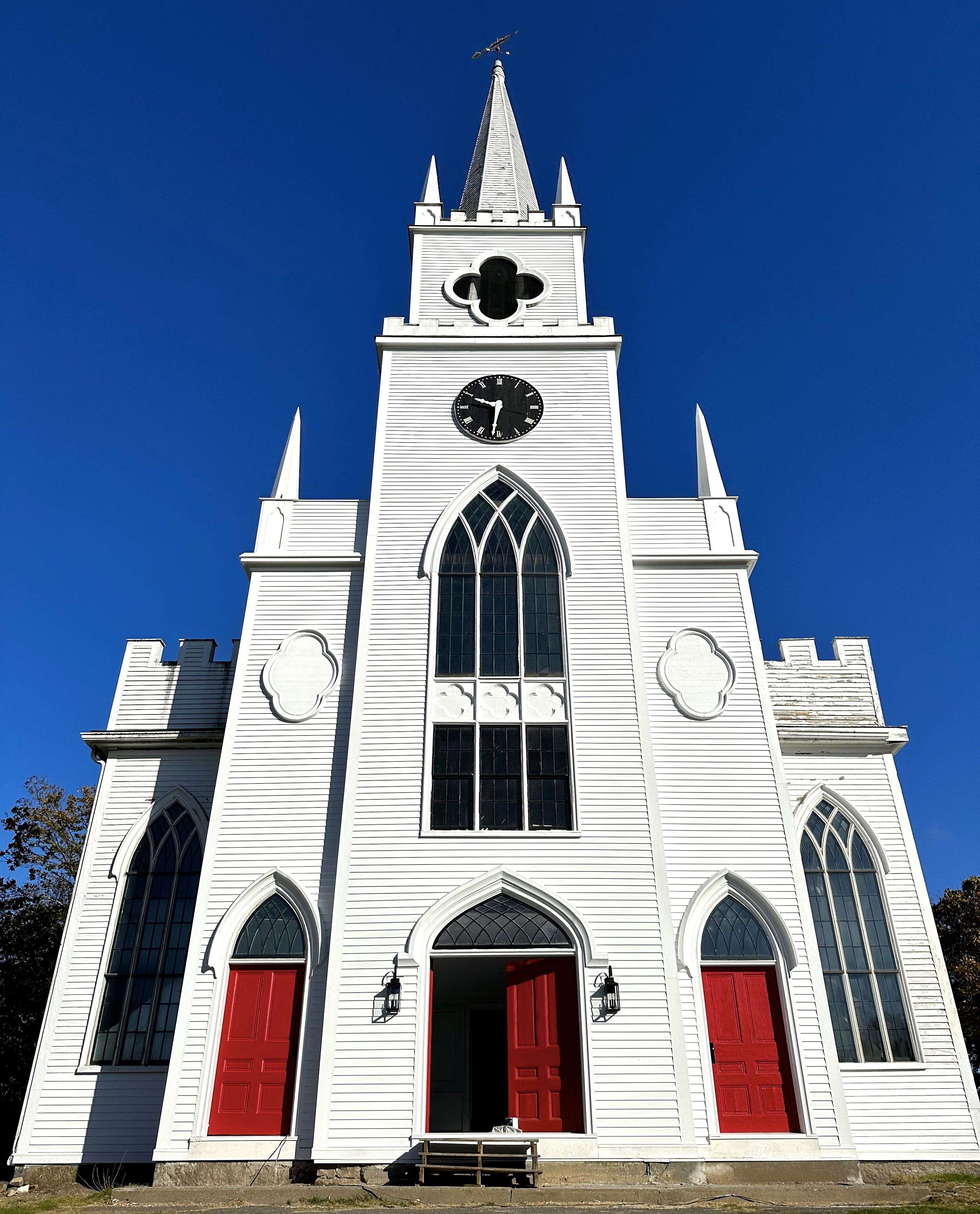 white church with red doors