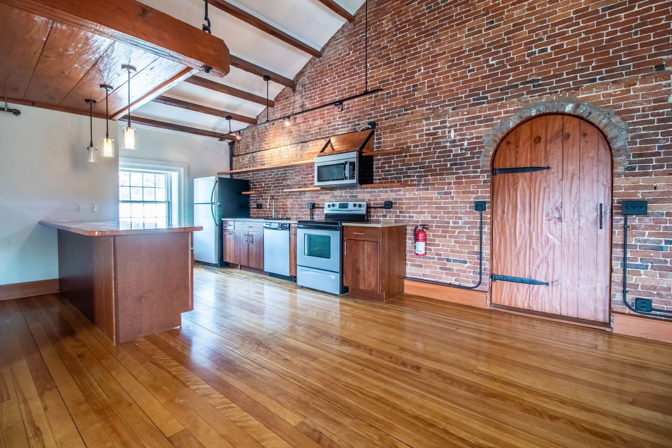 brick wall and wood floor