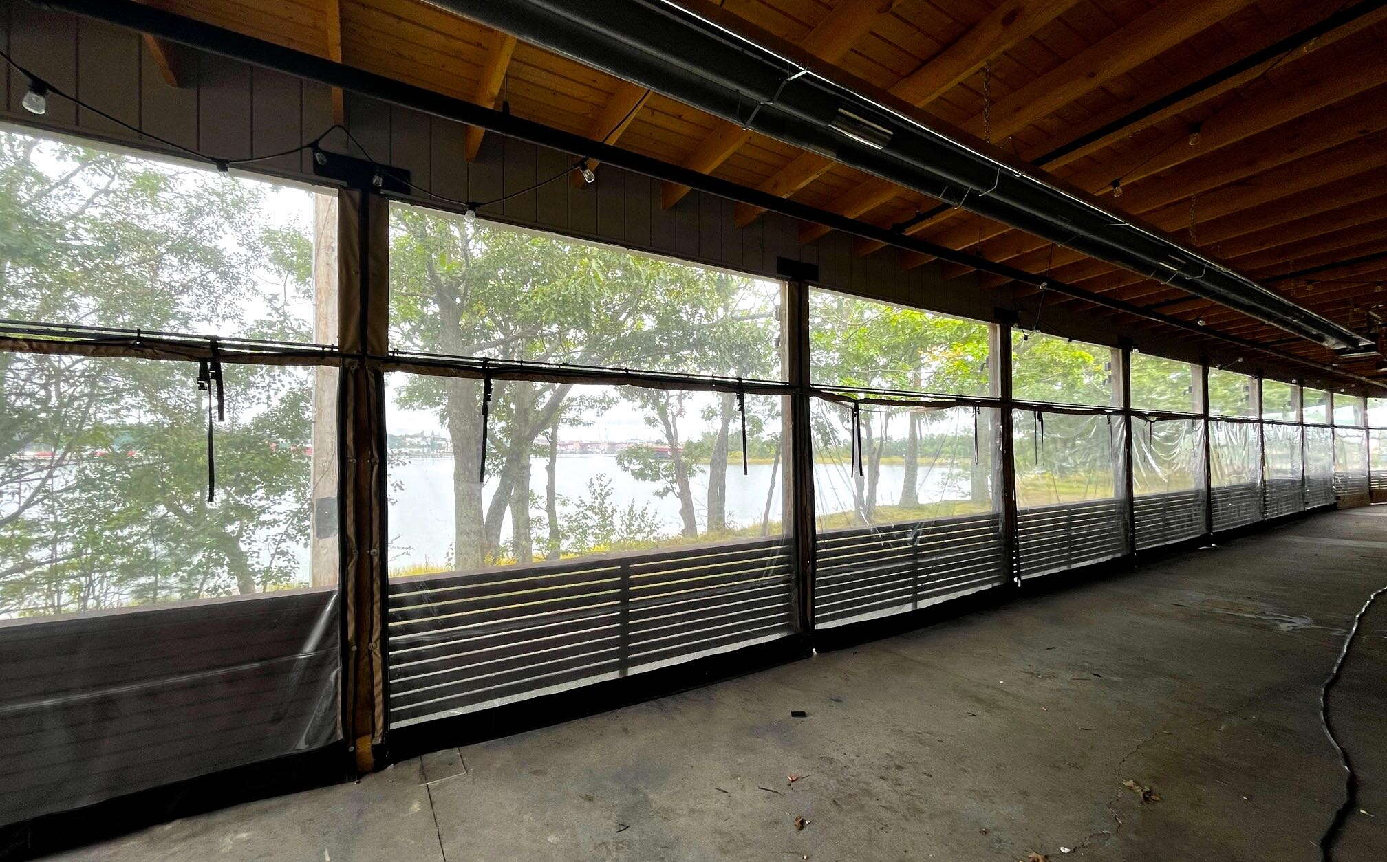 windows and hall with view of water