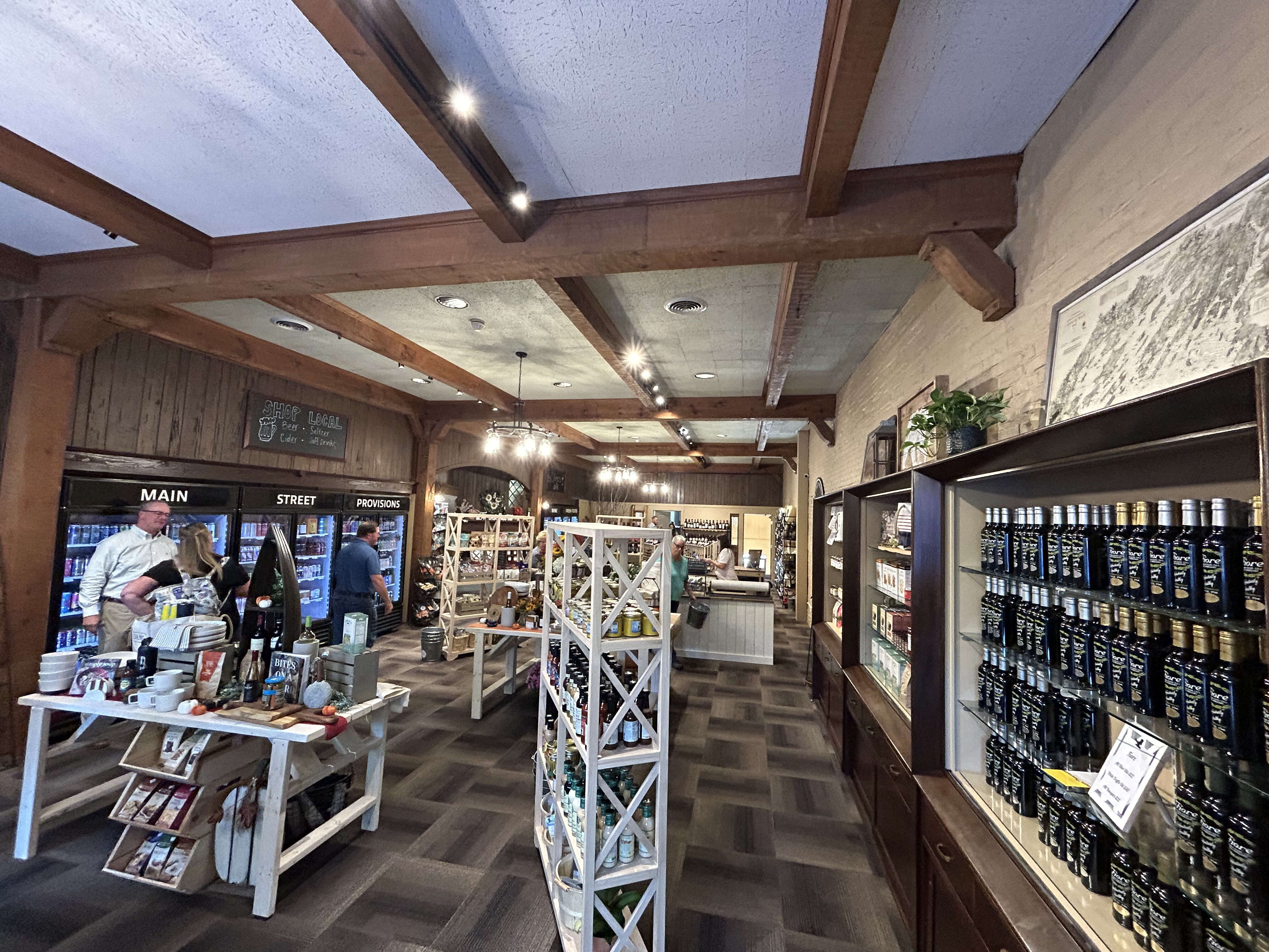 store interior with shelves products people