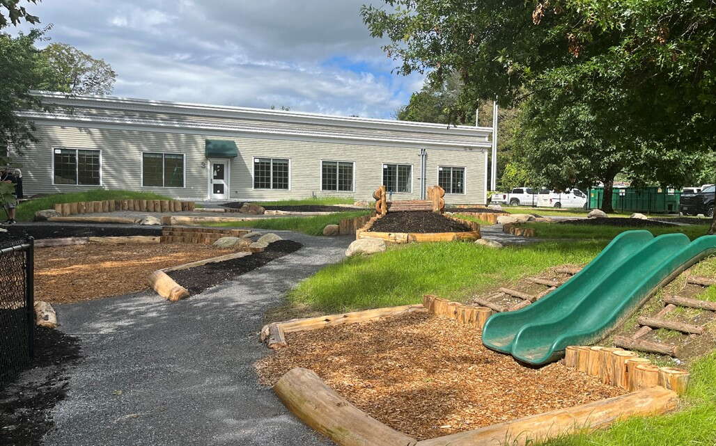 An outdoor area at Sweatt-Winter has play areas.