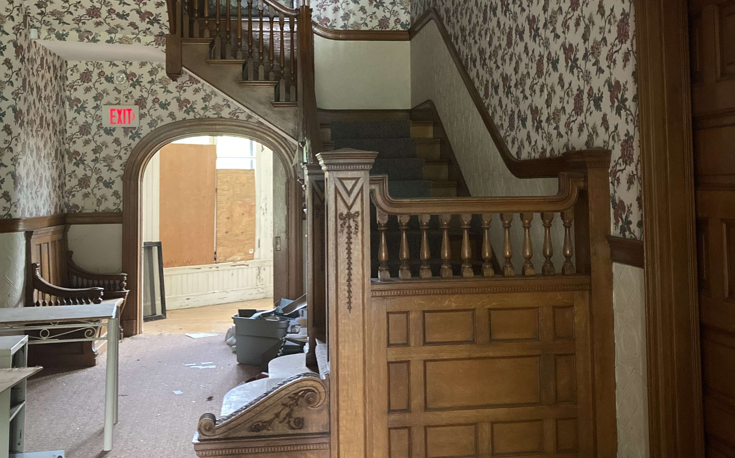 An old staircase and paneling are seen at the Gehring House.