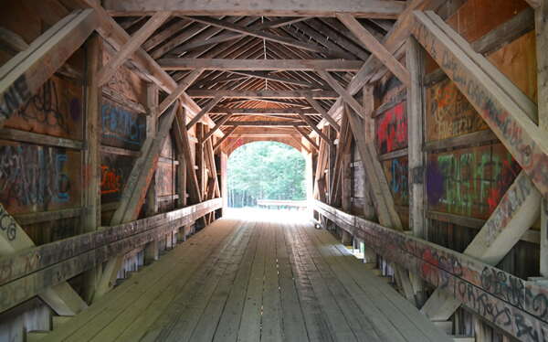 The interior of a covered bridge.