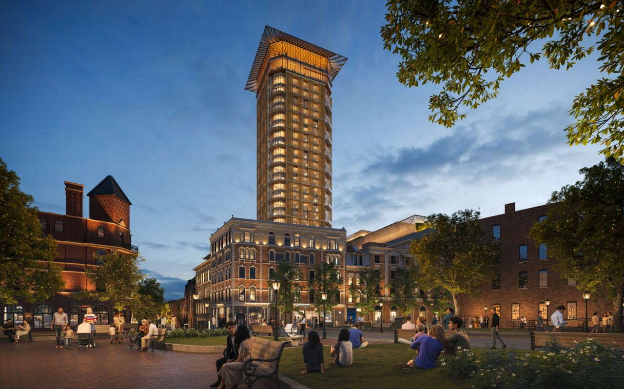 A rendering shows buildings and a plaza.