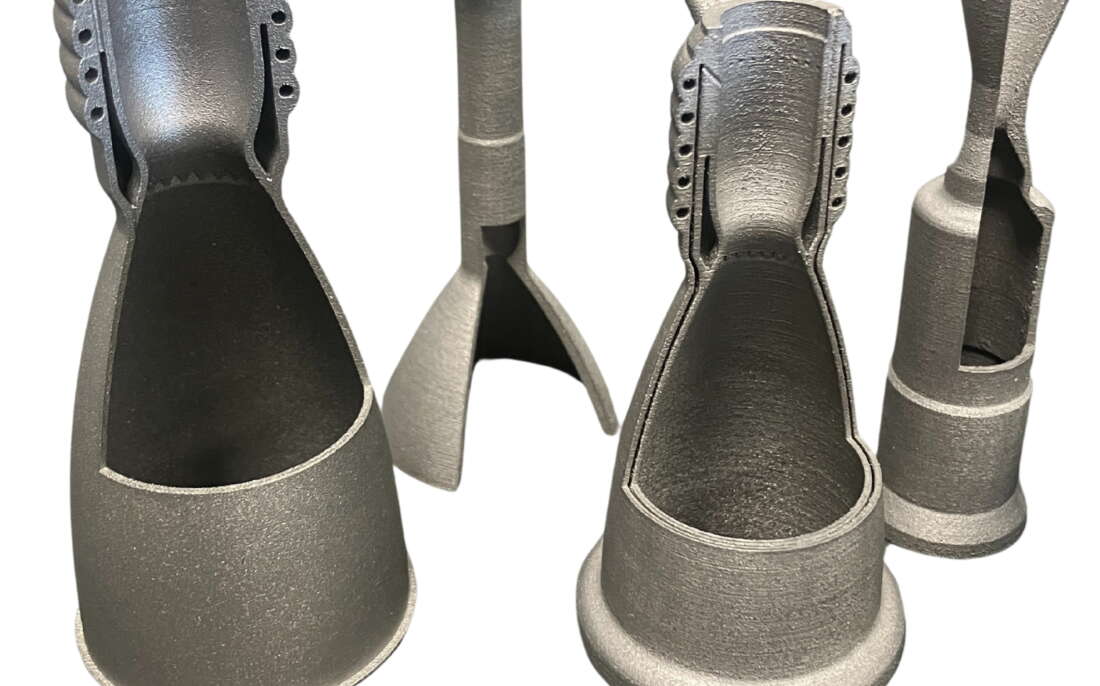 Metal parts are set on a white background.