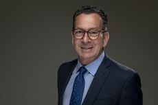 Dannel Malloy portrait in suit and tie 