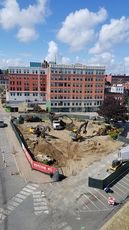 aerial of construction site and building