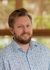 person in flowered shirt