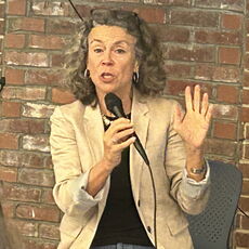Susan Morris with a microphone 
