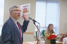 John Dieffenbacher-Krall speaks to a group of people.