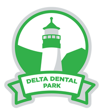 Delta Dental park at Hadlock Field logo with a lighthouse.