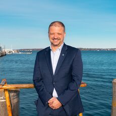 man standing on a pier