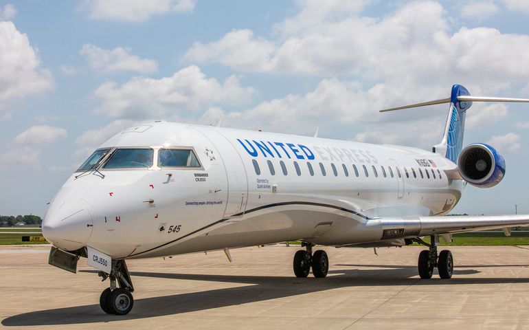 small jet airplane on a runway