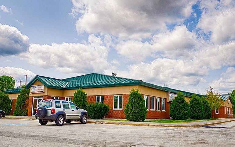 building and car