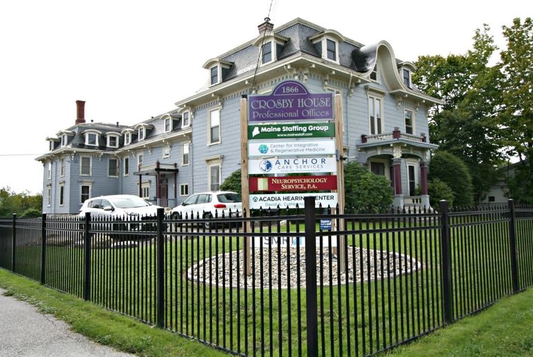 old house with sign