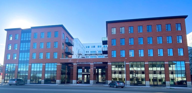 big brick building with lots of windows