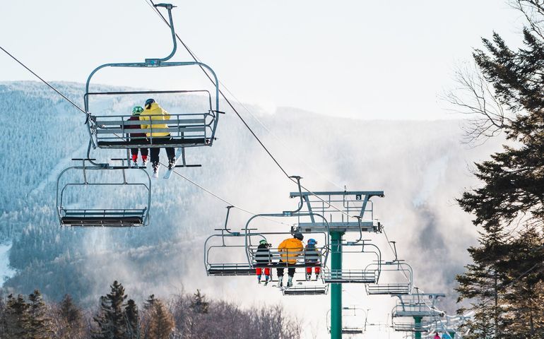 people on ski lifts