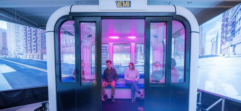 people sitting inside cabin