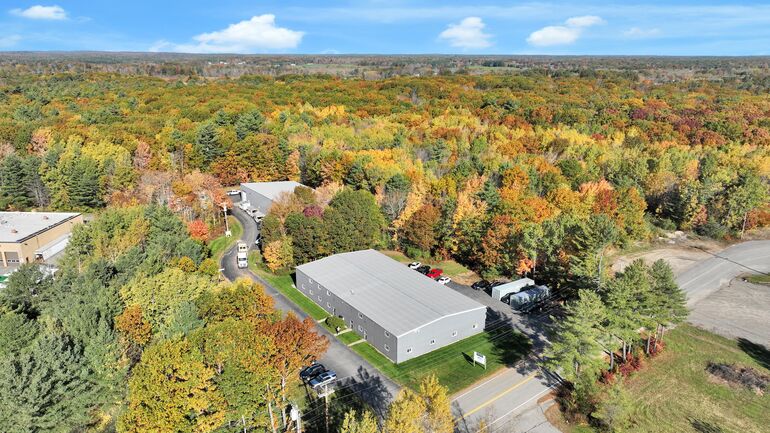 aerial of buildings and woods