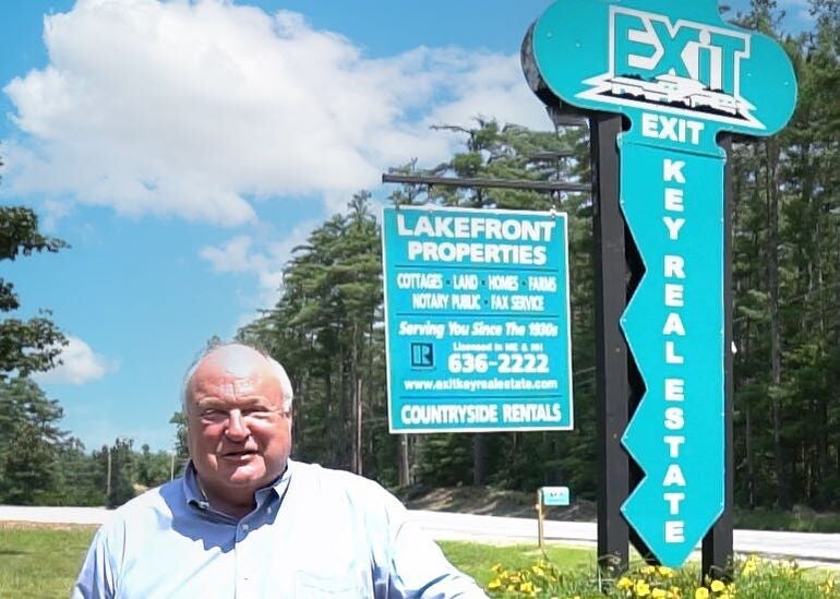 person in front of signs