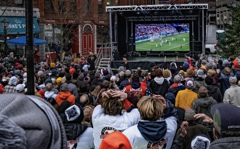 Fans watching soccer game in Portland.