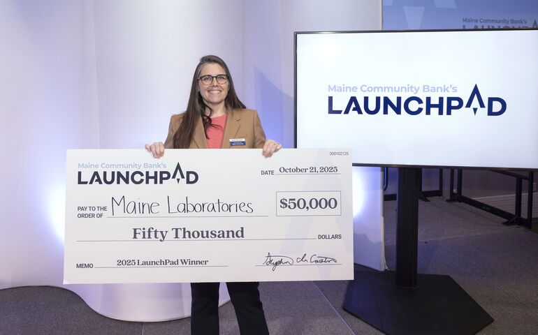 Katie Richards of Maine Laboratories with Launchpad prize